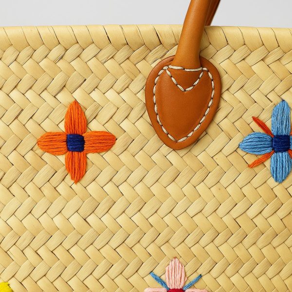 Moroccan Handwoven Floral Straw Basket with Leather Handles close up